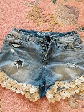 High-Rise Light Blue Distressed Denim Shorts with Crochet Trim